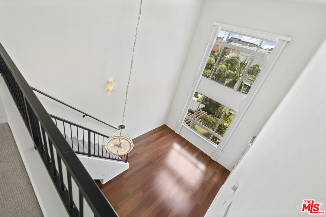100 South Alameda Street, Unit 418 Los Angeles, CA 90012 - Photo 18 of 32 a view of an entryway with wooden floor