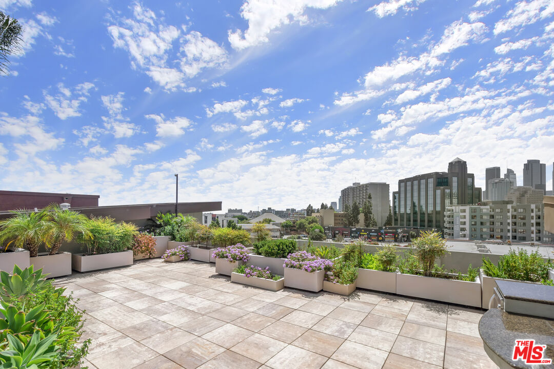 100 South Alameda Street, Unit 418 Los Angeles, CA 90012 - Photo 31 of 32 a view of a terrace with couches and sky view