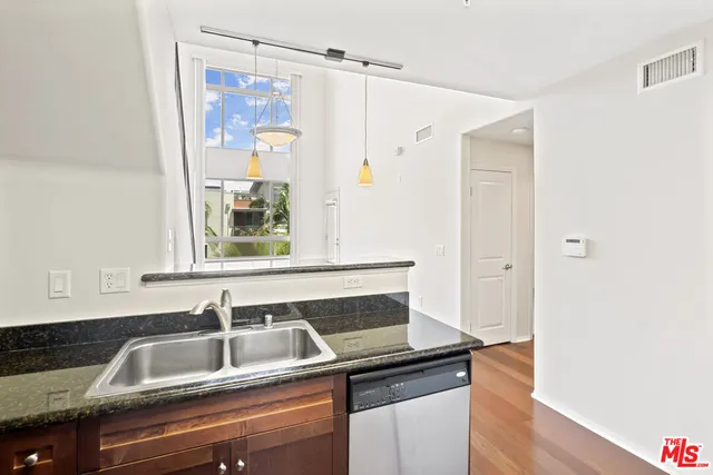 a view of a sink and a mirror