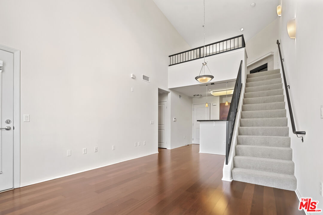 100 South Alameda Street, Unit 418 Los Angeles, CA 90012 - Photo 8 of 32 a view of entryway with wooden floor