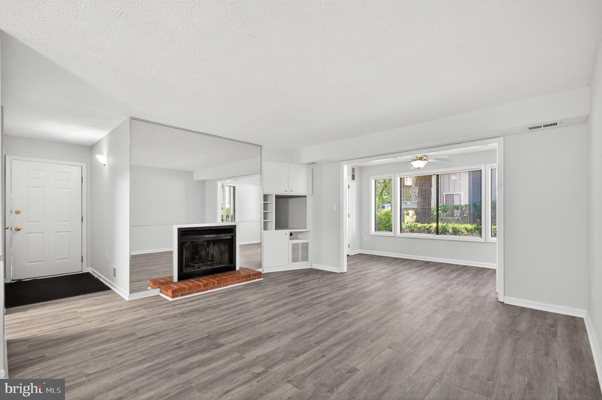 2281 Hunter's Run Drive, Unit 2281 Reston, VA 20191 - Photo 9 of 25 Bright and airy living space awaits.