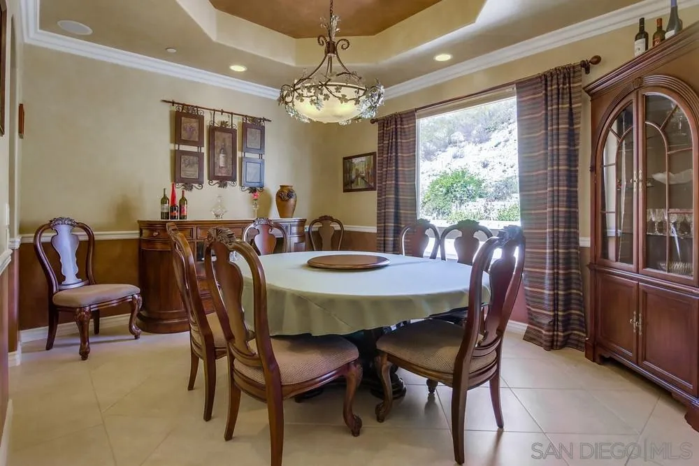 15399 Isla Vista Road Jamul, CA 91935 - Photo 7 of 48 a view of a dining room with furniture and window
