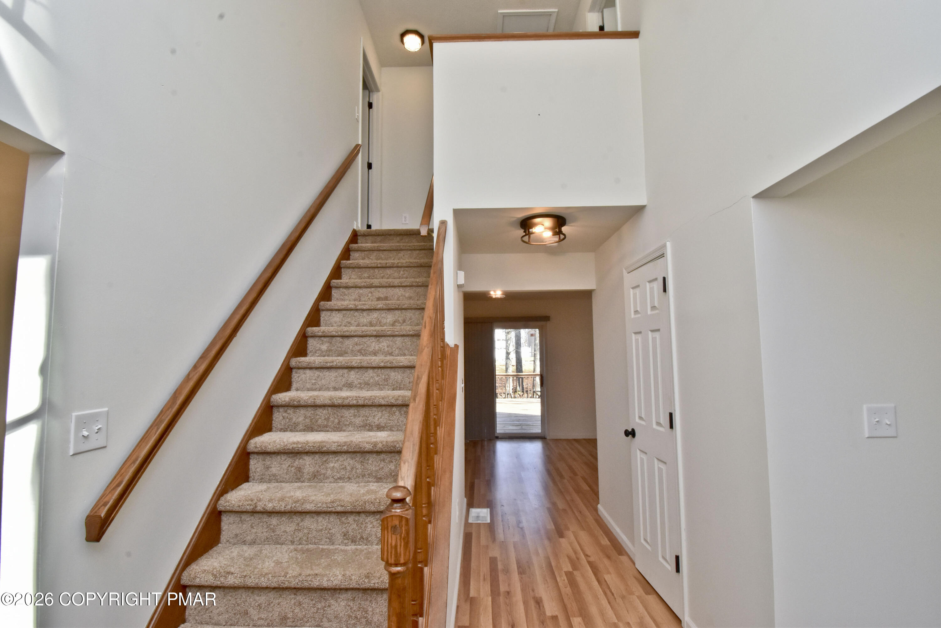 108 Pipher Road Bushkill, PA 18324 - Photo 19 of 50 a view of a hallway with wooden floor and entryway