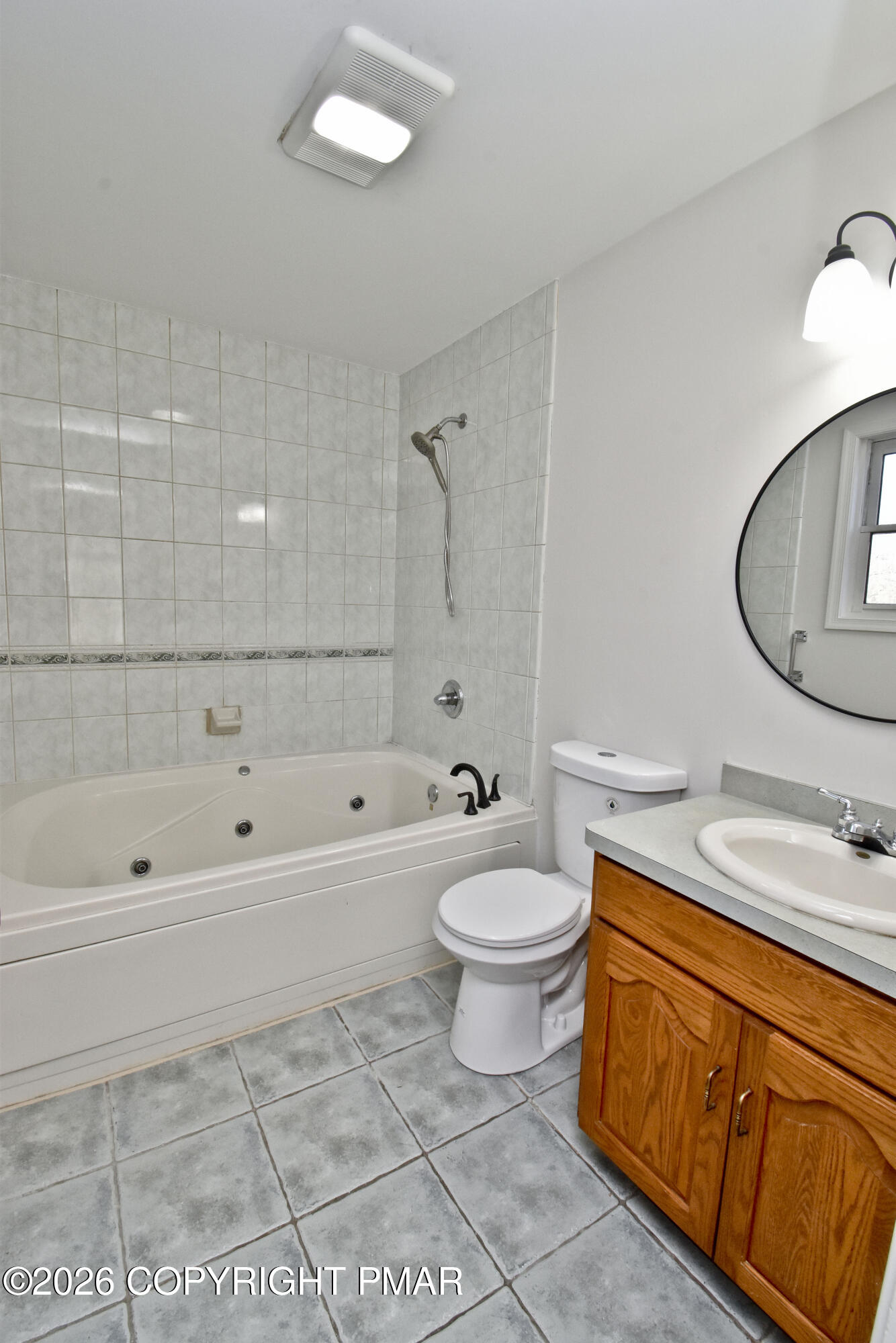 108 Pipher Road Bushkill, PA 18324 - Photo 27 of 50 a bathroom with a sink a toilet and bathtub