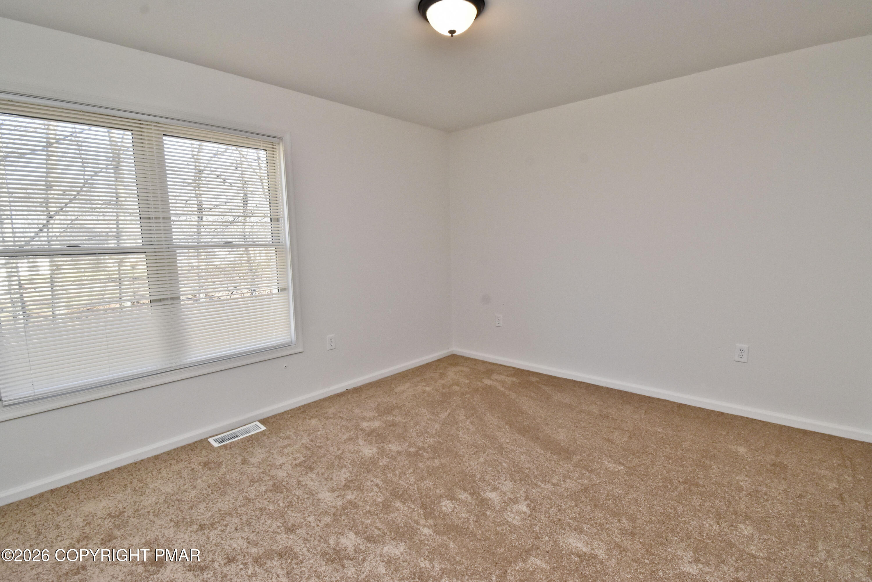 108 Pipher Road Bushkill, PA 18324 - Photo 29 of 50 an empty room with a window