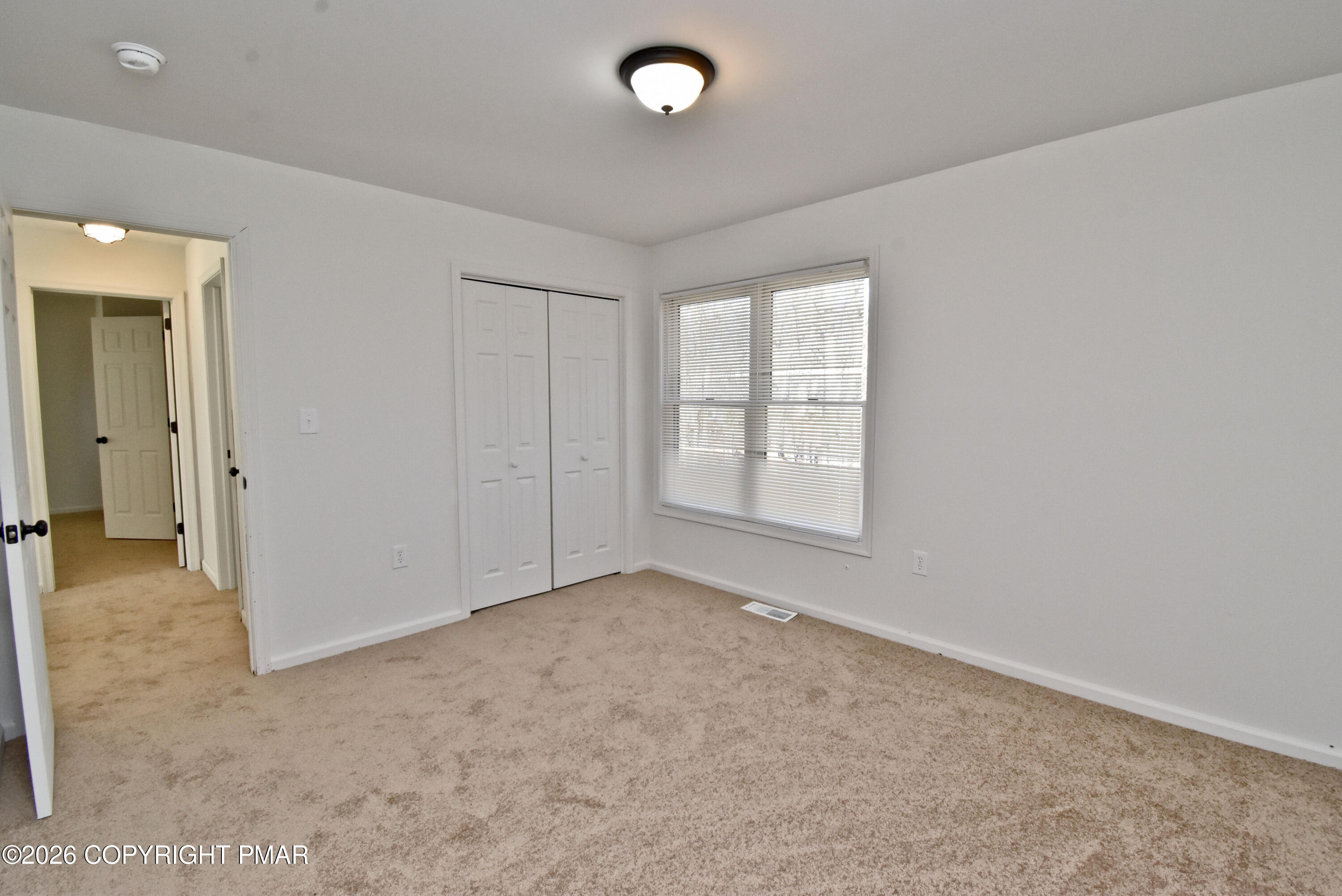 108 Pipher Road Bushkill, PA 18324 - Photo 30 of 50 an empty room with windows