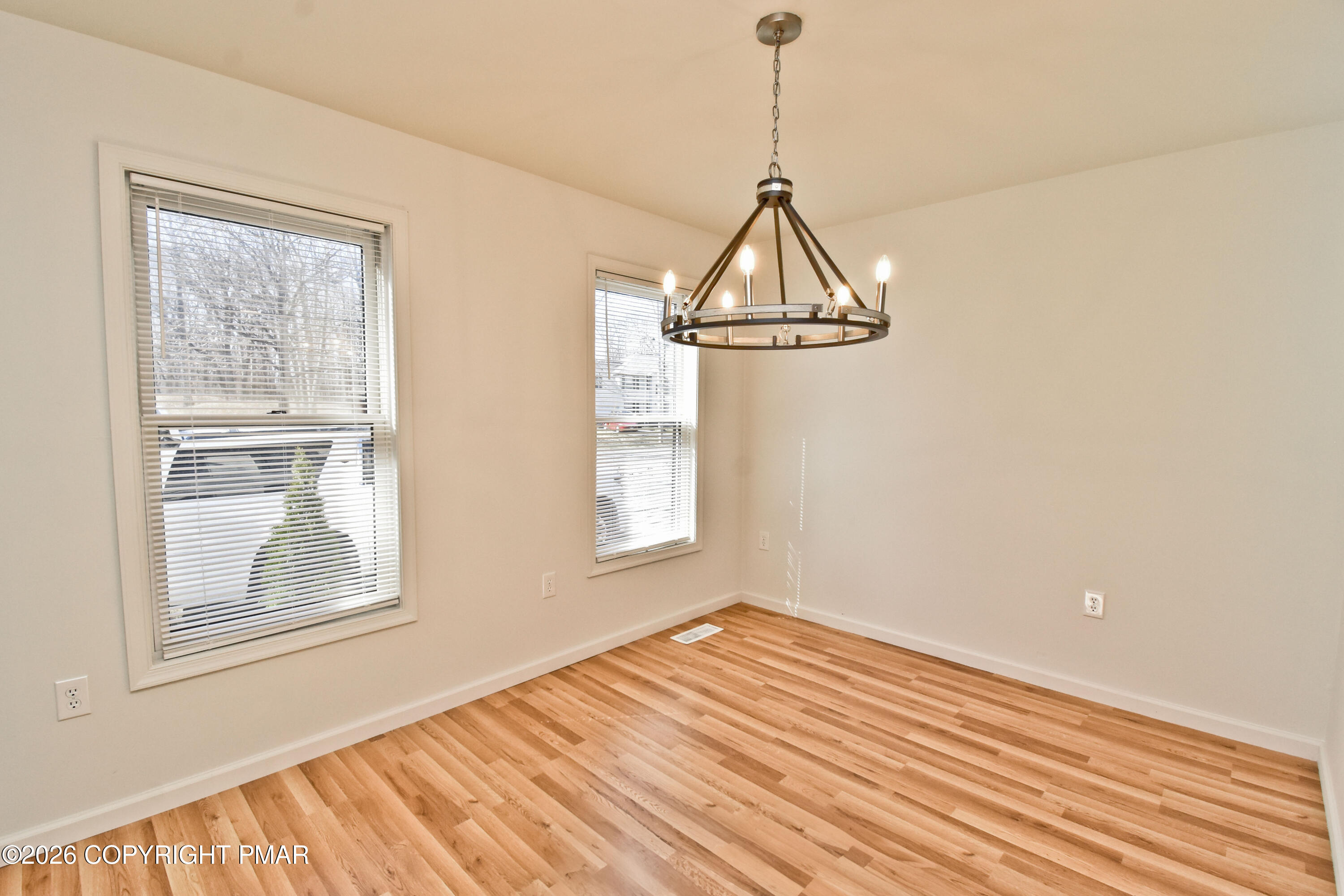 108 Pipher Road Bushkill, PA 18324 - Photo 3 of 50 a view of a room with wooden floor and windows