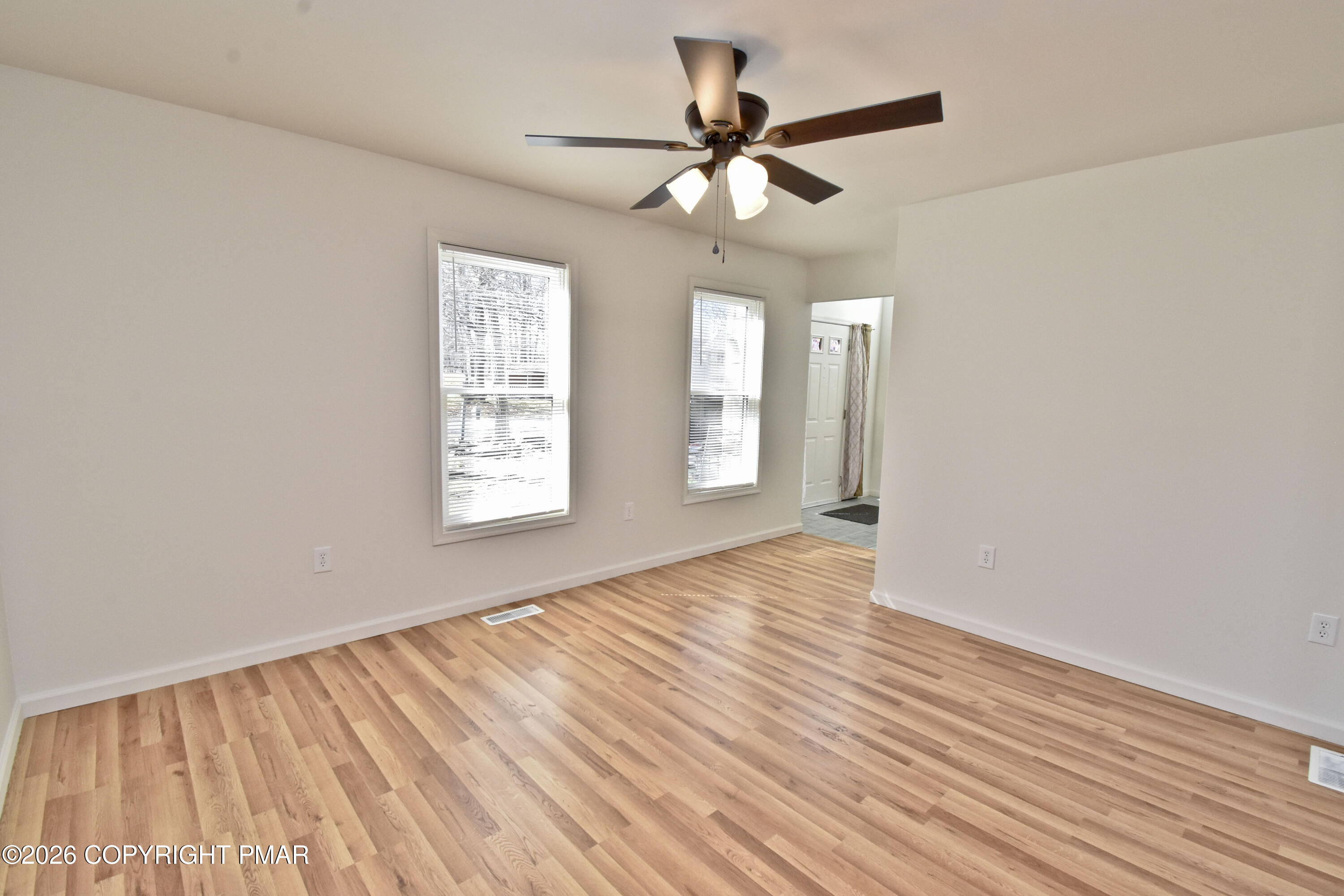 108 Pipher Road Bushkill, PA 18324 - Photo 5 of 50 wooden floor in an empty room with a window