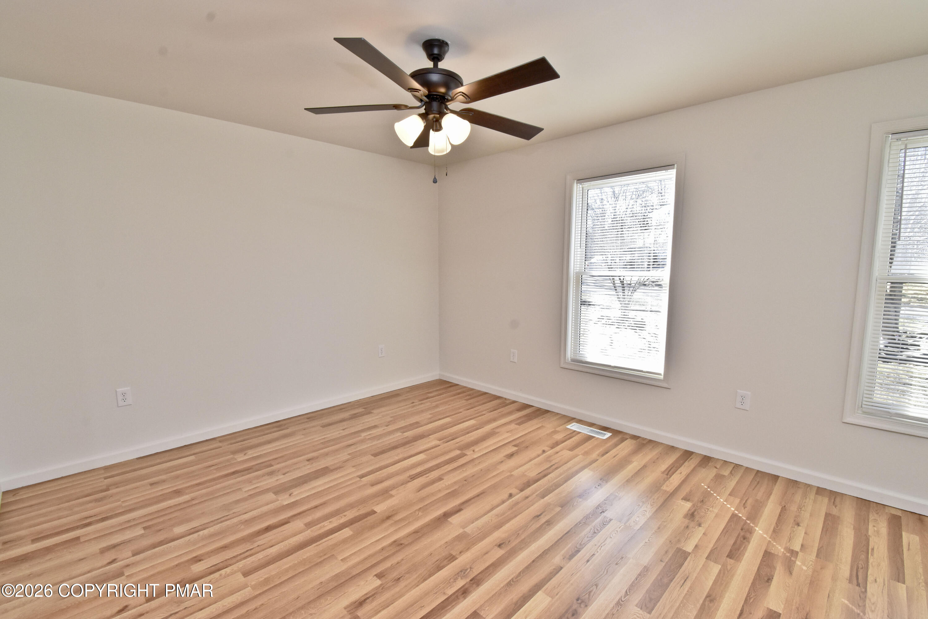 108 Pipher Road Bushkill, PA 18324 - Photo 6 of 50 wooden floor in an empty room with a window