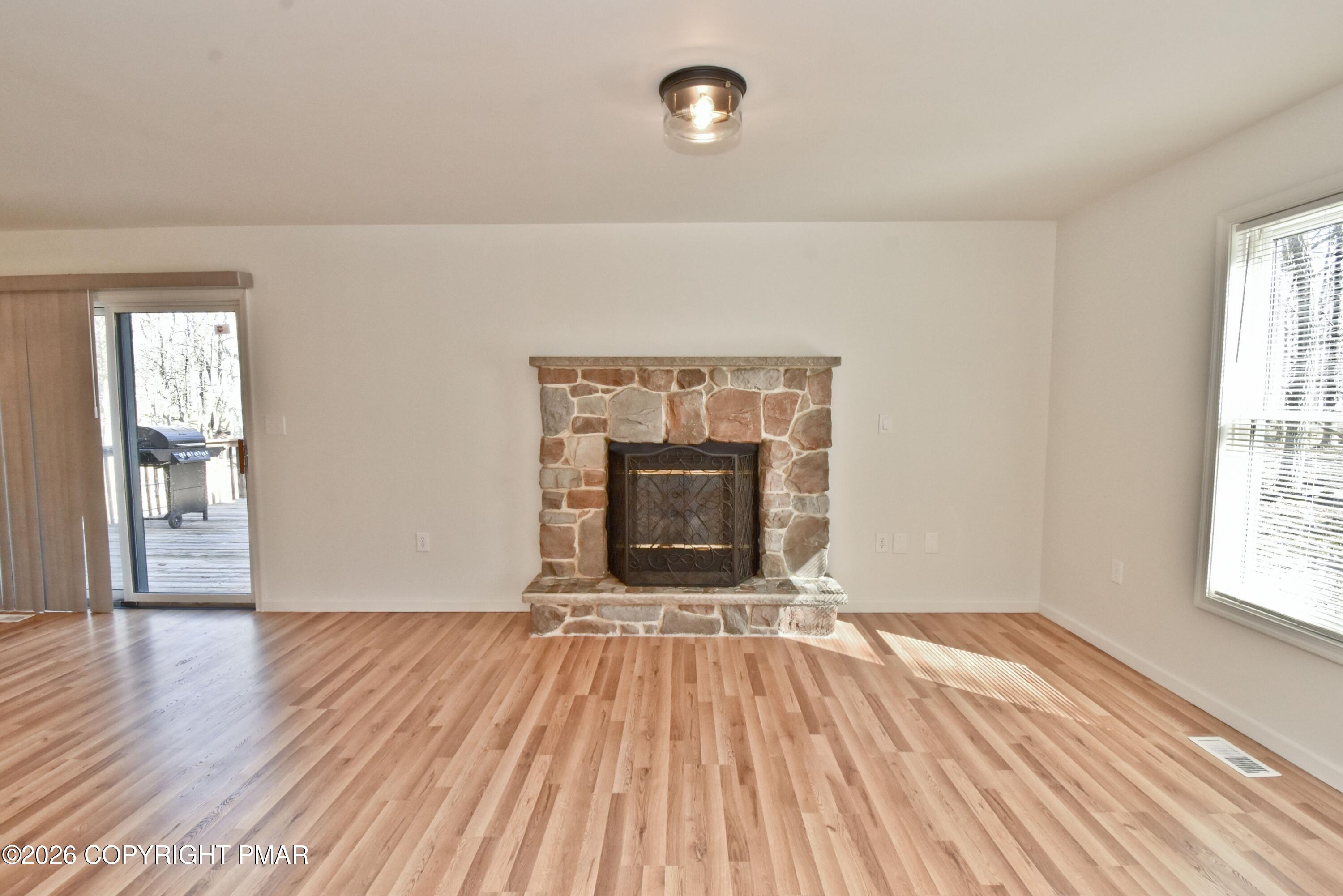 108 Pipher Road Bushkill, PA 18324 - Photo 10 of 50 wooden floor in an empty room with a window
