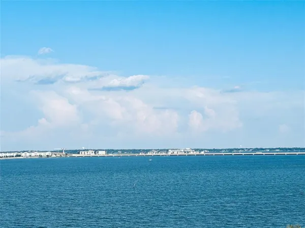 a view of an ocean and mountain