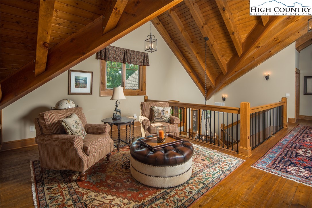 5212 Reynolds Parkway Boone, NC 28607 - Photo 22 of 50 a living room with furniture and a rug