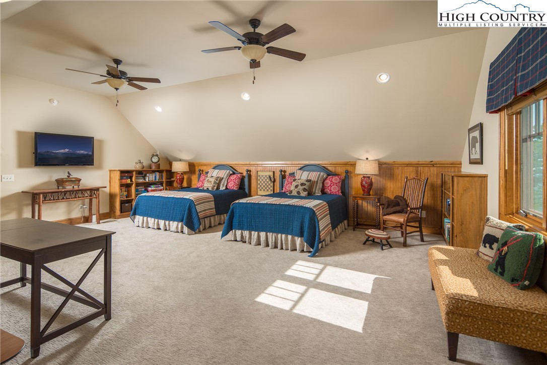 5212 Reynolds Parkway Boone, NC 28607 - Photo 27 of 50 a living room with furniture and a flat screen tv