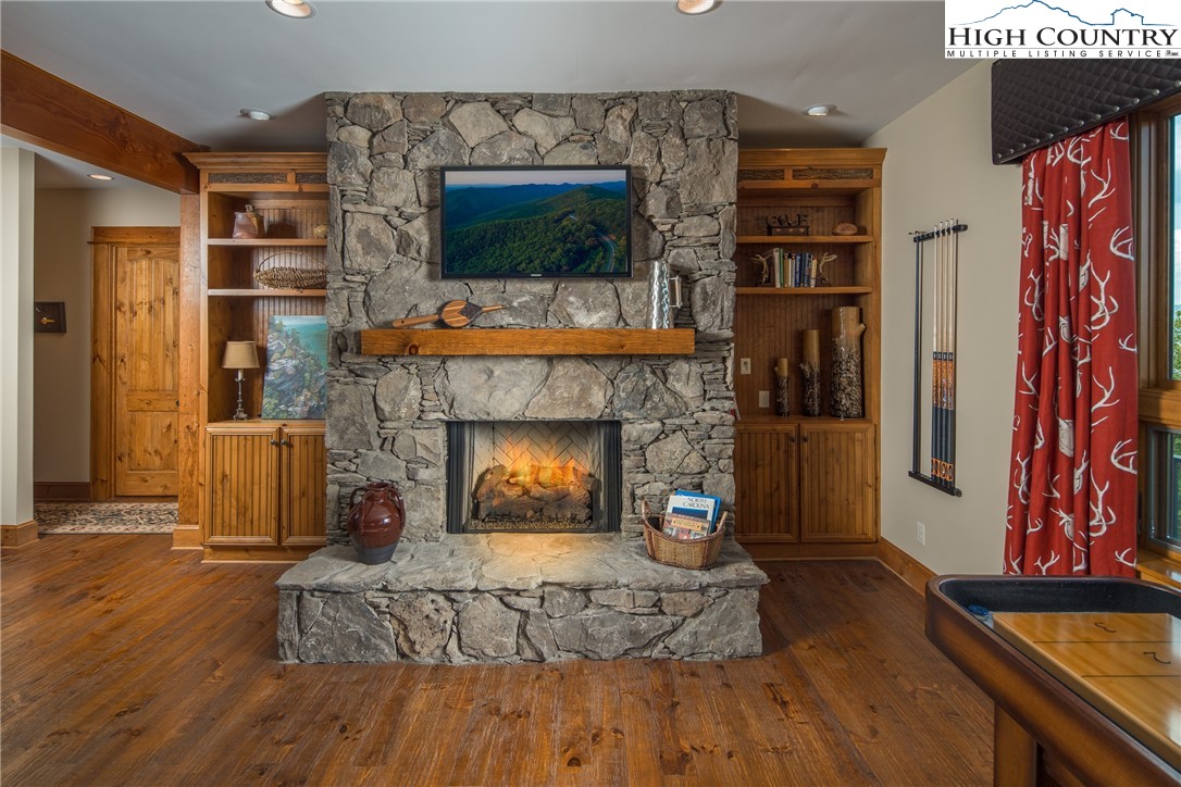5212 Reynolds Parkway Boone, NC 28607 - Photo 30 of 50 a living room with furniture and a fireplace