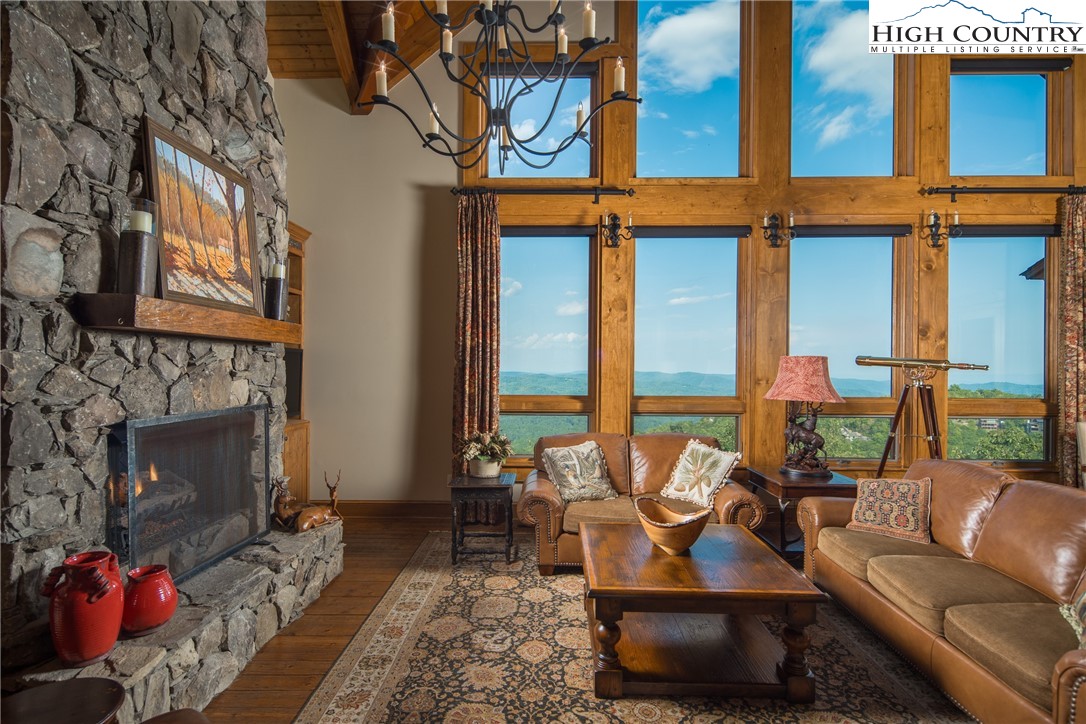 5212 Reynolds Parkway Boone, NC 28607 - Photo 3 of 50 a view of a livingroom with furniture and a fireplace
