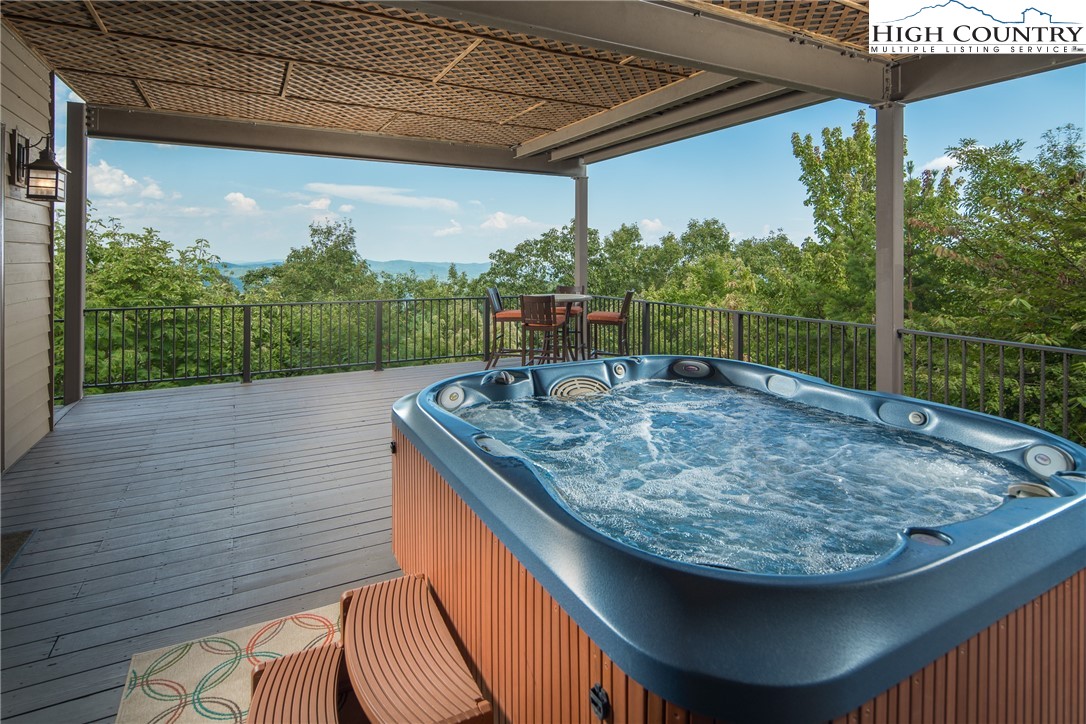 5212 Reynolds Parkway Boone, NC 28607 - Photo 35 of 50 a view of a porch with a table