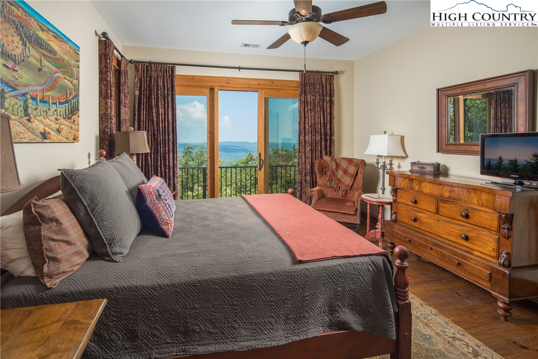 5212 Reynolds Parkway Boone, NC 28607 - Photo 38 of 50 a bed room with a bed and a dresser