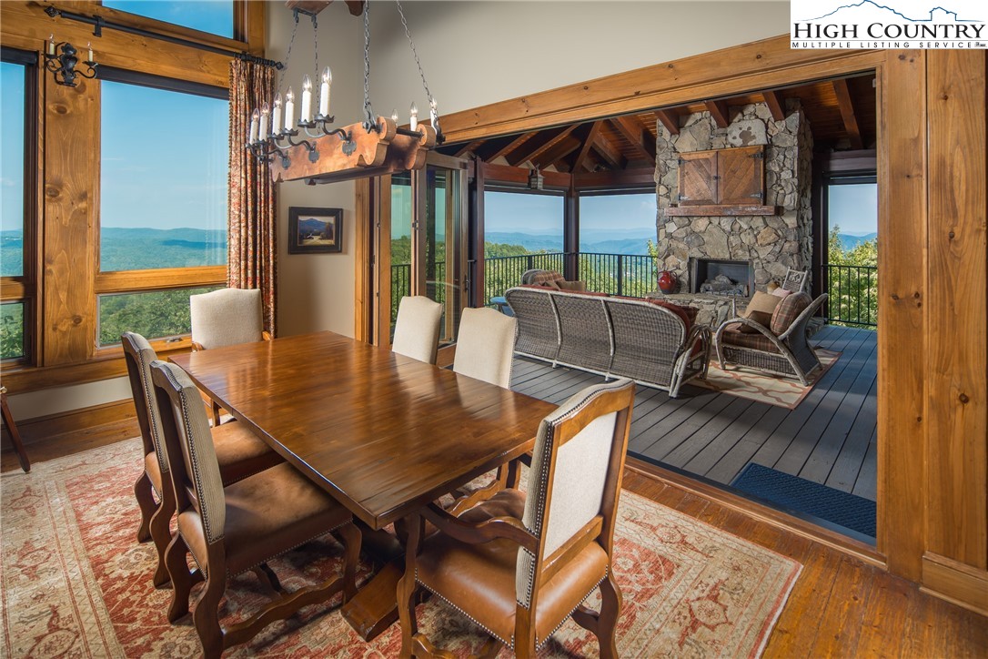 5212 Reynolds Parkway Boone, NC 28607 - Photo 7 of 50 a view of a dining table and chairs in the patio