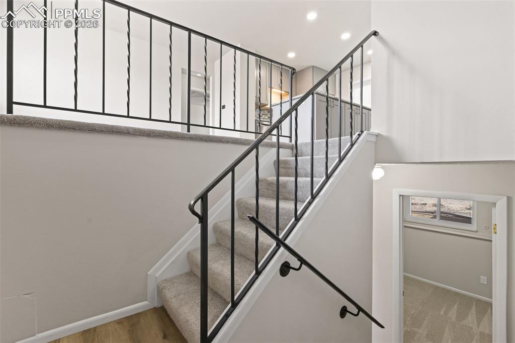 1620 Winnebago Road Colorado Springs, CO 80915 - Photo 2 of 25 a view of staircase with railing and white walls