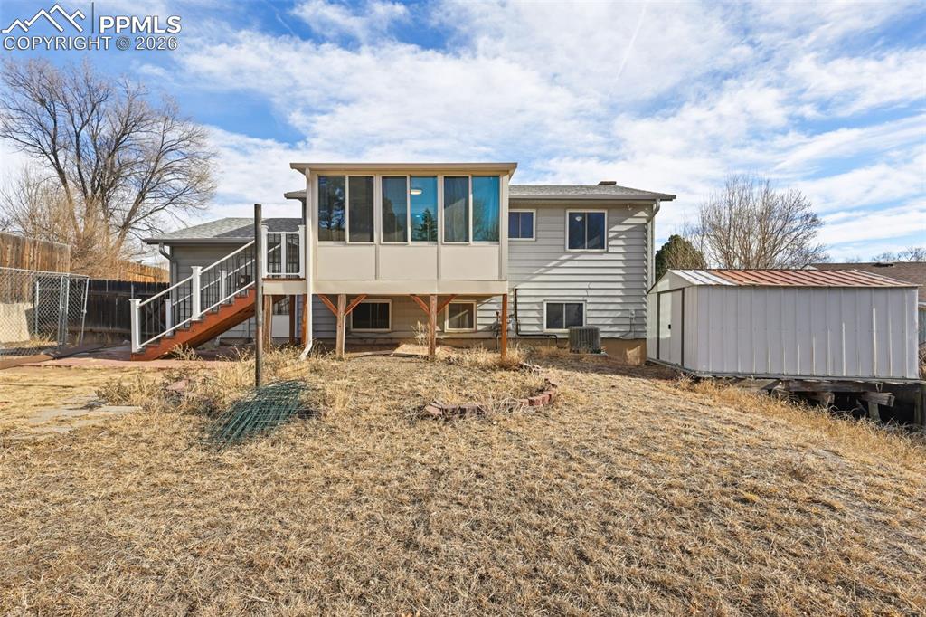 1620 Winnebago Road Colorado Springs, CO 80915 - Photo 21 of 25 a view of a house with a yard