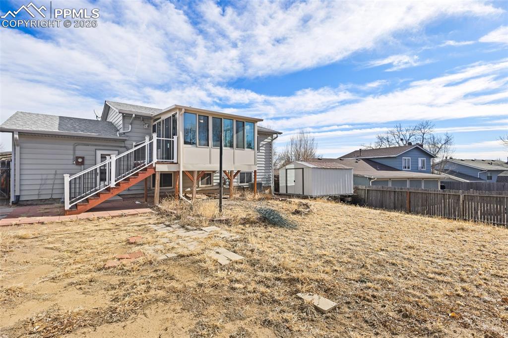 1620 Winnebago Road Colorado Springs, CO 80915 - Photo 23 of 25 a view of a house with a snow