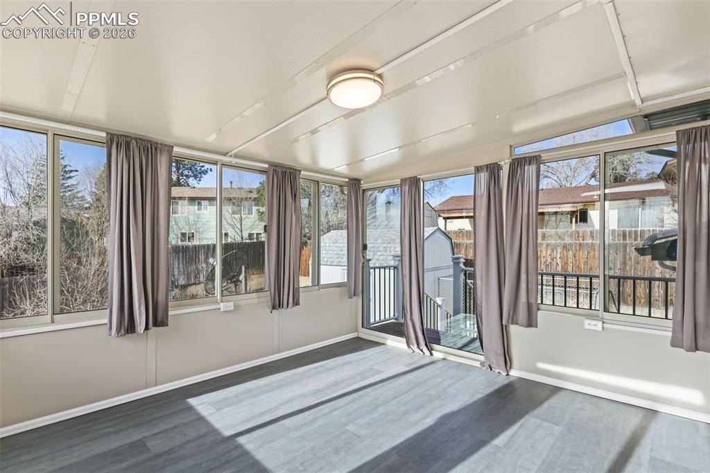 1620 Winnebago Road Colorado Springs, CO 80915 - Photo 9 of 25 a view of an entryway with wooden floor