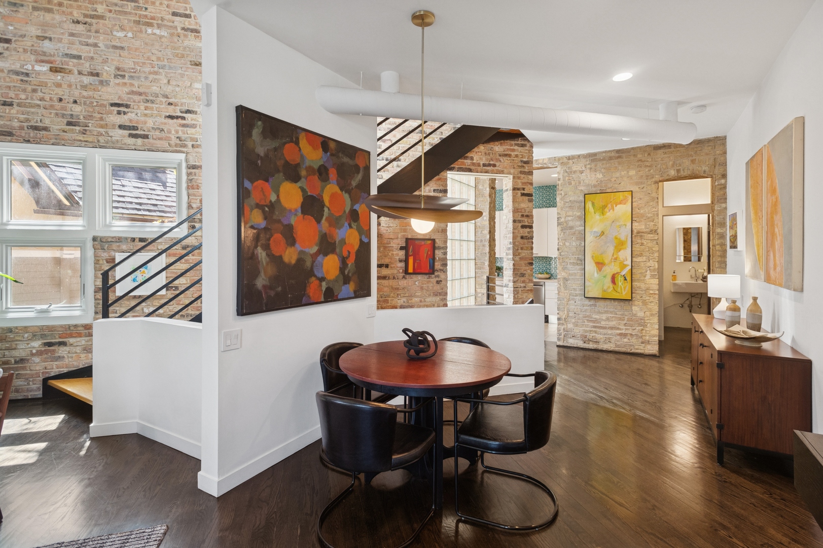 832 West Wolfram Street Chicago, IL 60657 - Photo 14 of 51 a dining room with wooden floor and large windows