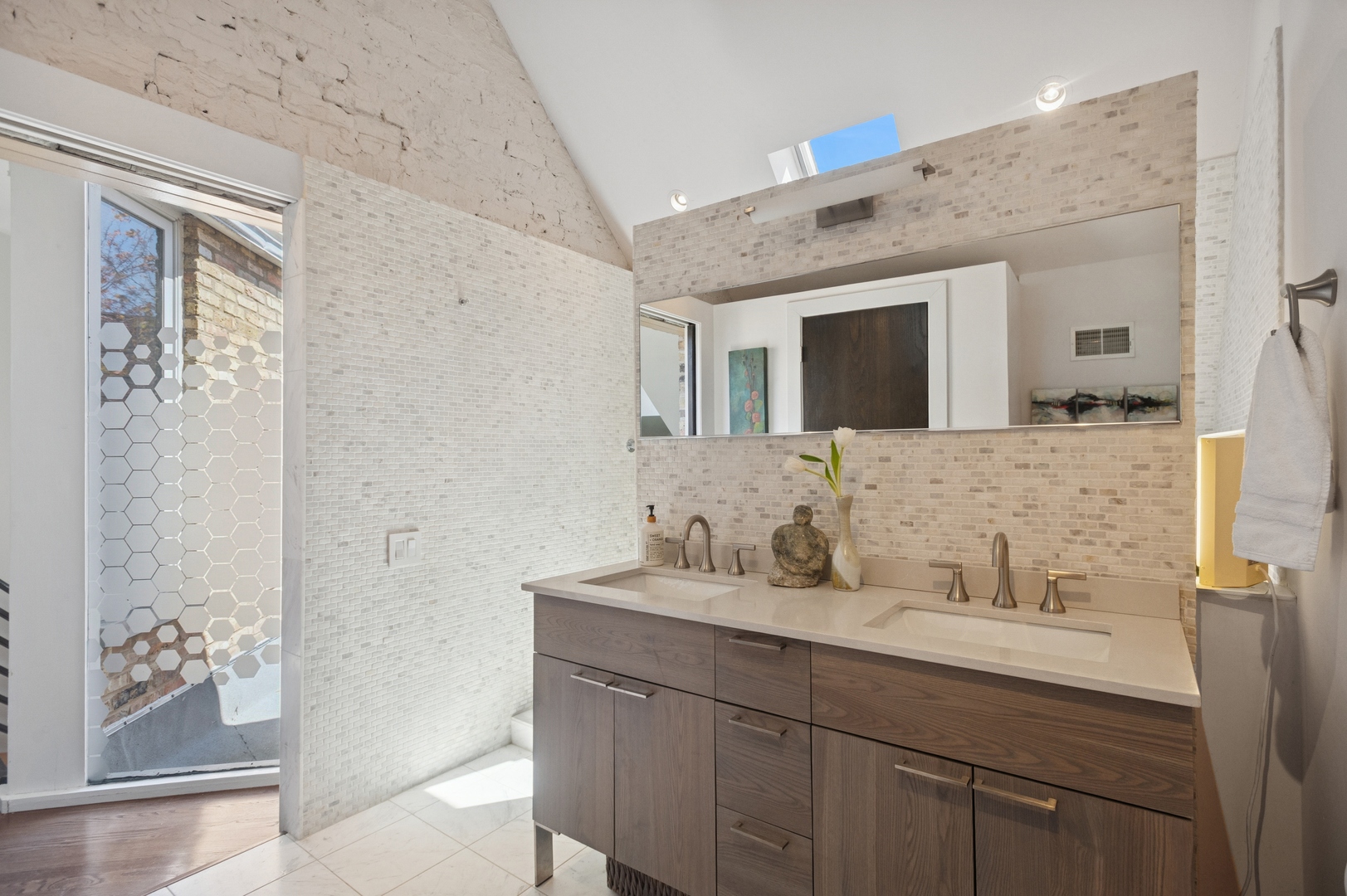 832 West Wolfram Street Chicago, IL 60657 - Photo 37 of 51 a bathroom with a sink and a mirror