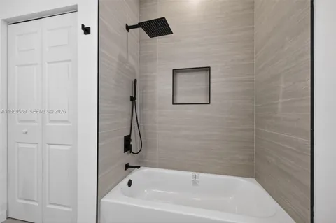 a bathroom with a bathtub