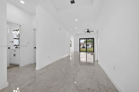 wooden floor in an empty room and a window