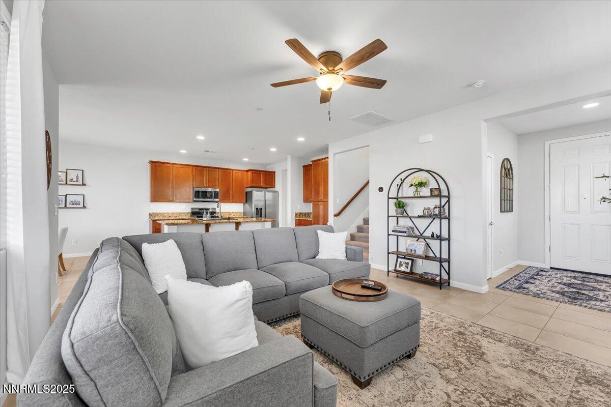 2642 Alessandro Court Sparks, NV 89434 - Photo 13 of 52 a living room with furniture and a large window