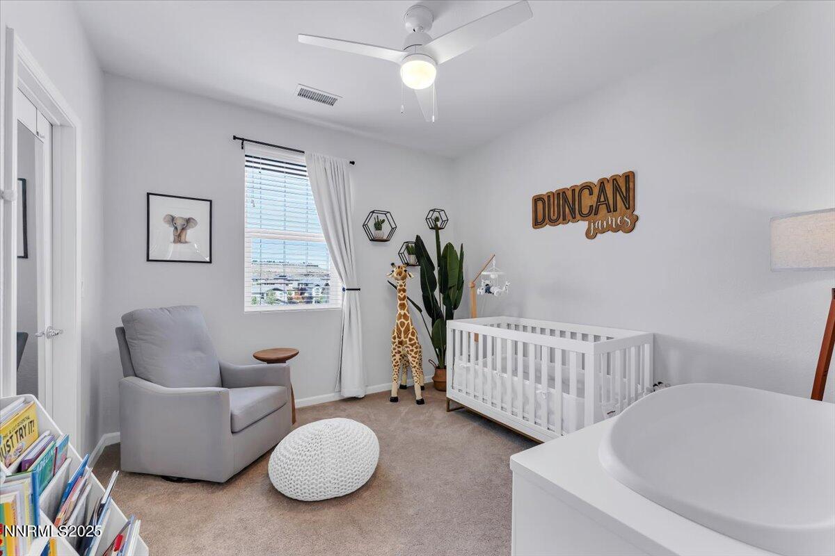 2642 Alessandro Court Sparks, NV 89434 - Photo 26 of 52 a bedroom with furniture and a window