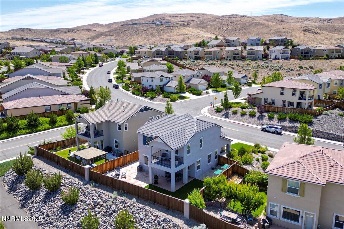 2642 Alessandro Court Sparks, NV 89434 - Photo 47 of 52 an aerial view of a house with a mountain