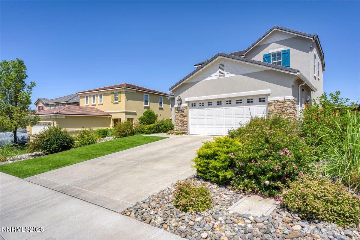 2642 Alessandro Court Sparks, NV 89434 - Photo 6 of 52 a view of a street with a house in the background