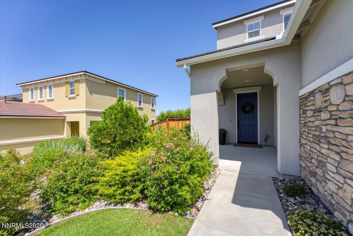 2642 Alessandro Court Sparks, NV 89434 - Photo 7 of 52 a front view of a house with a yard