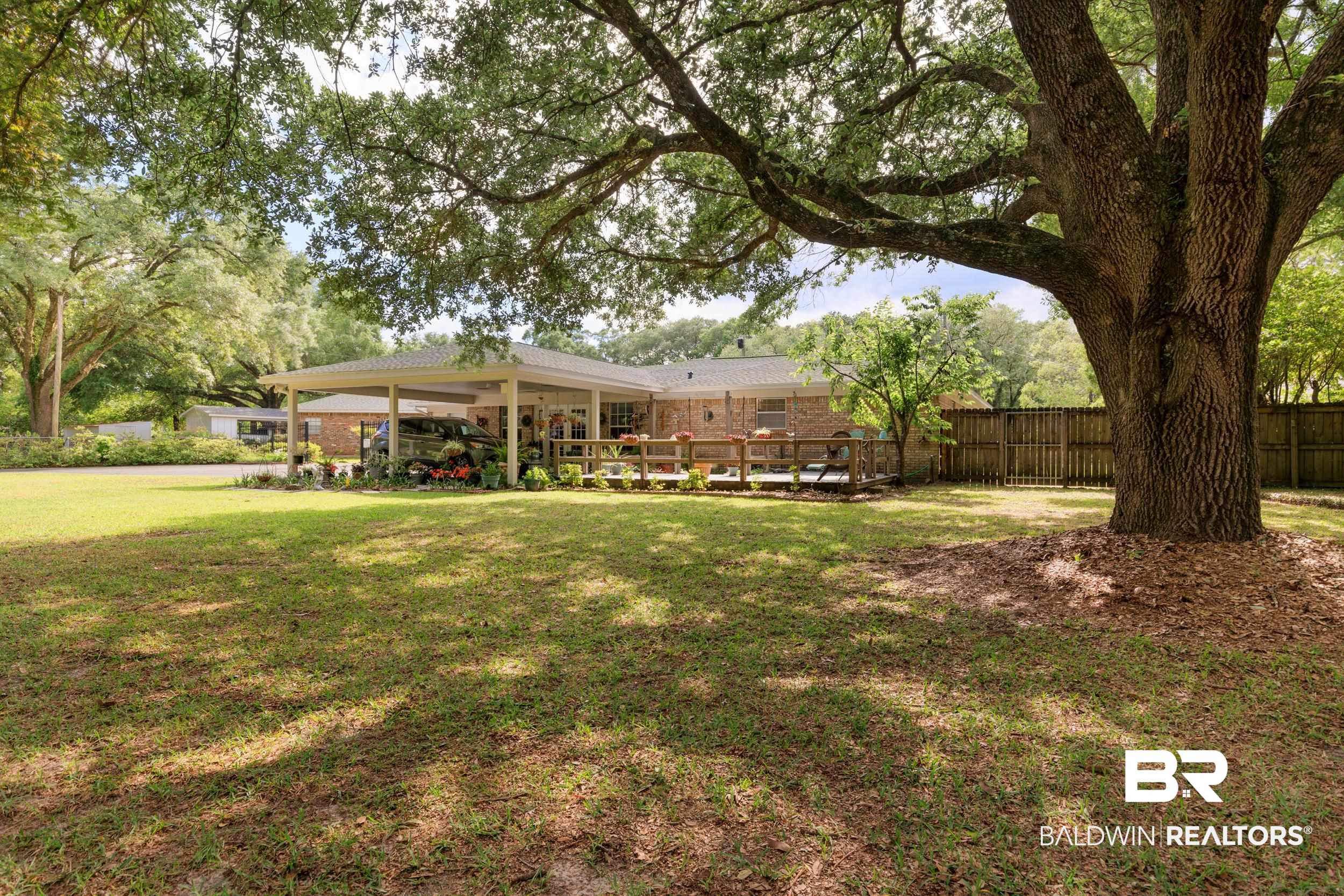 1367 Spring Valley Court Mobile, AL 36693 - Photo 27 of 29 Spacious lawn area featuring mature trees providing shade