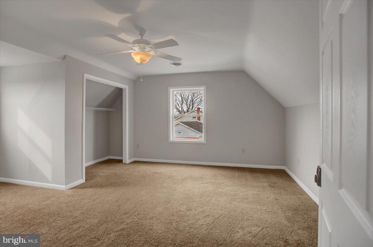 124 West Hunter Road Carlisle, PA 17015 - Photo 29 of 36 an empty room with windows and fan