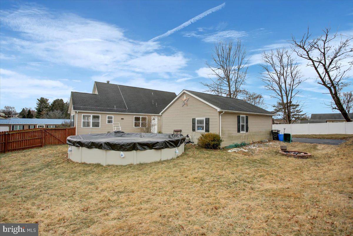 124 West Hunter Road Carlisle, PA 17015 - Photo 35 of 36 a front view of a house with a yard