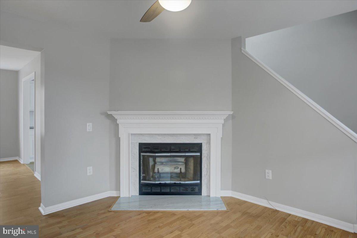 124 West Hunter Road Carlisle, PA 17015 - Photo 6 of 36 a living room with a fireplace