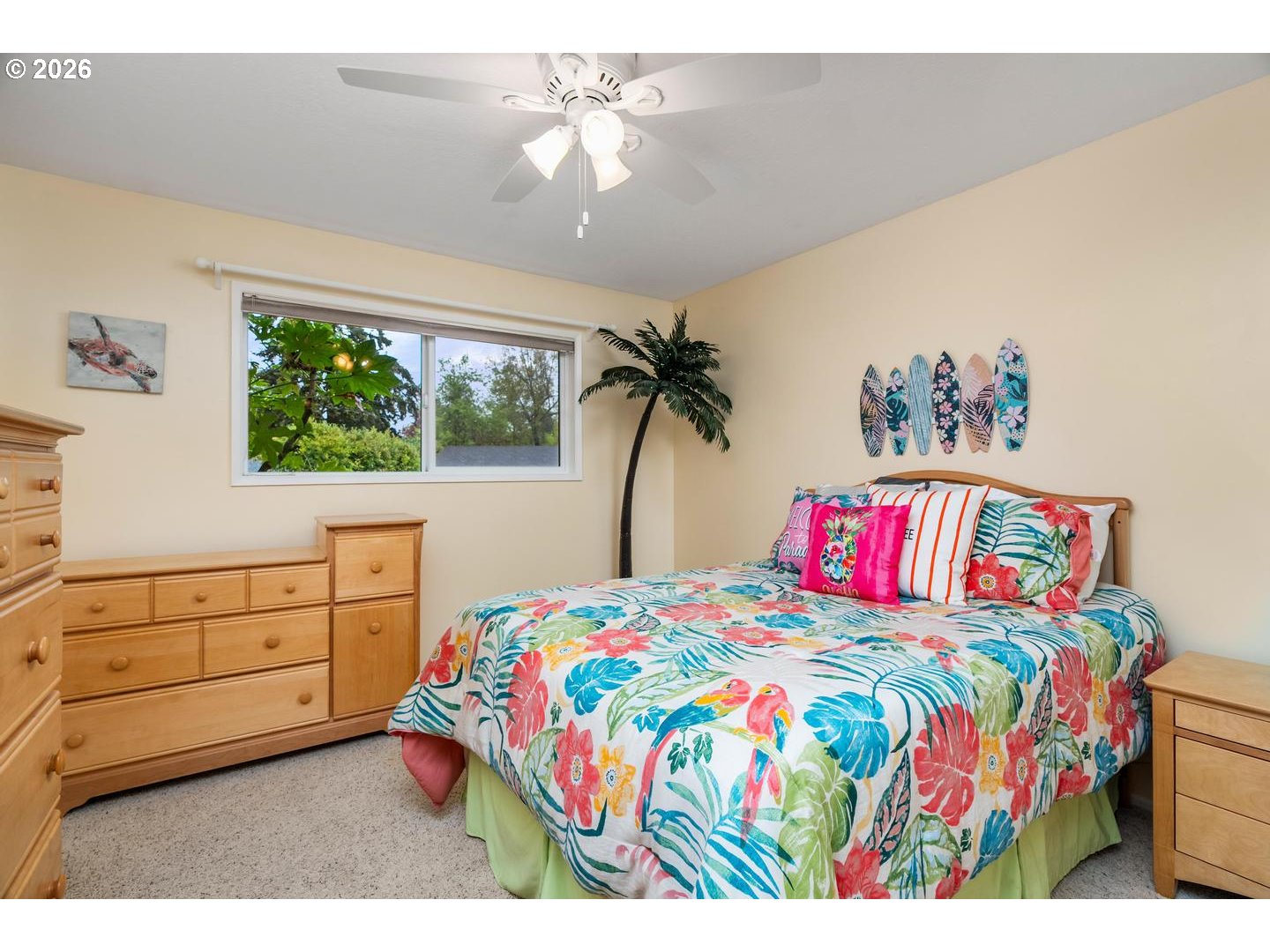 9070 Southwest Howatt Street Portland, OR 97225 - Photo 27 of 48 a bedroom with a bed dresser and a window