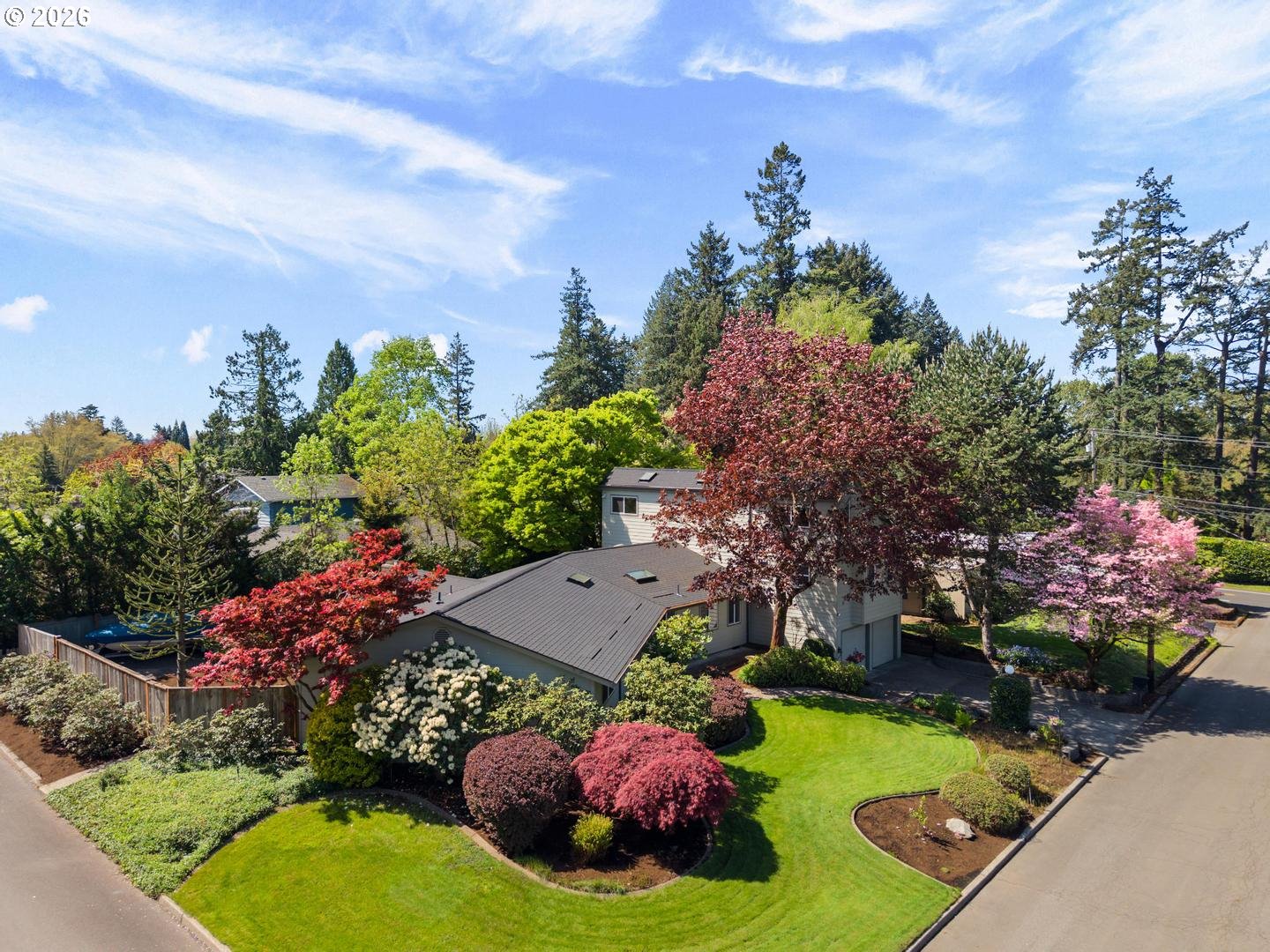 9070 Southwest Howatt Street Portland, OR 97225 - Photo 44 of 48 aerial view of a house with a garden