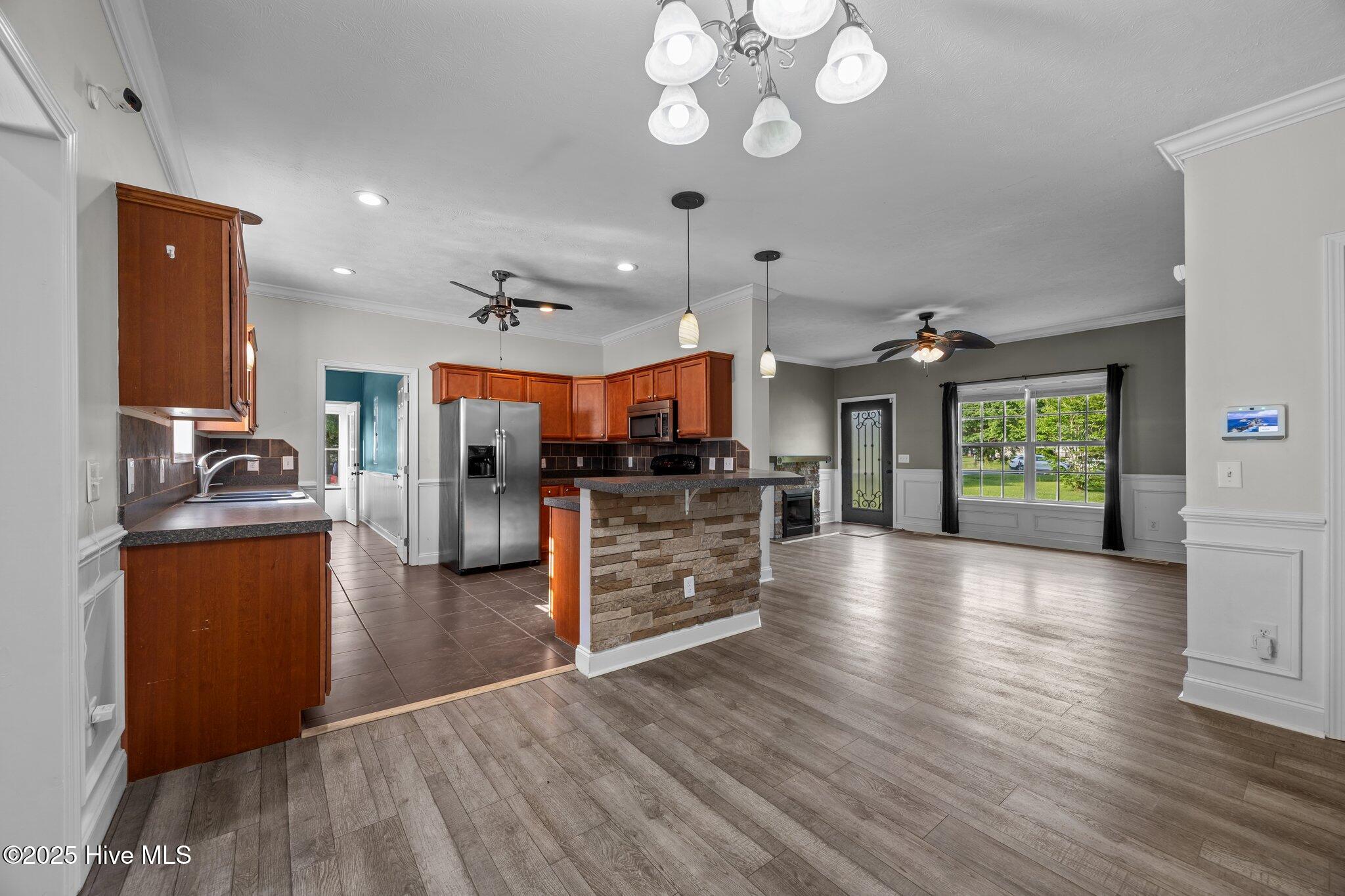 103 Meadowview Road Jacksonville, NC 28540 - Photo 11 of 50 Kitchen to Dining to Den