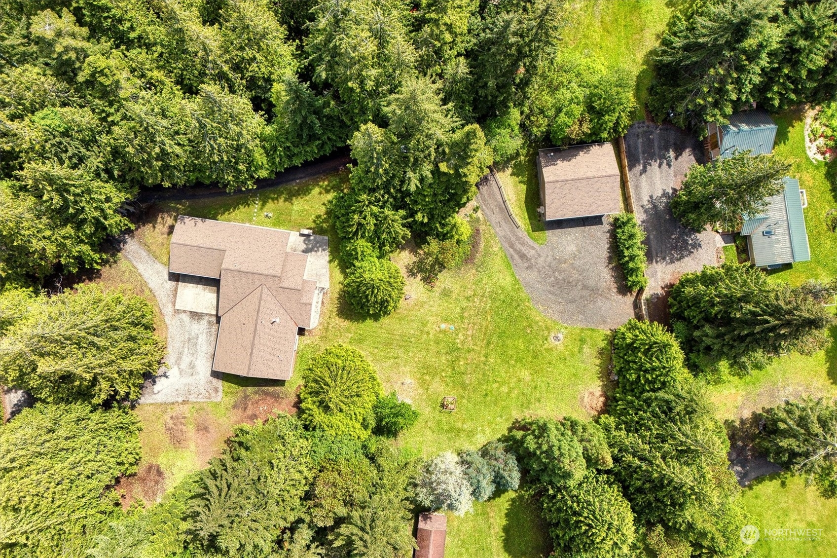 42 Kirner Ridge Lane Sequim, WA 98382 - Photo 3 of 40 an aerial view of a house with swimming pool and garden