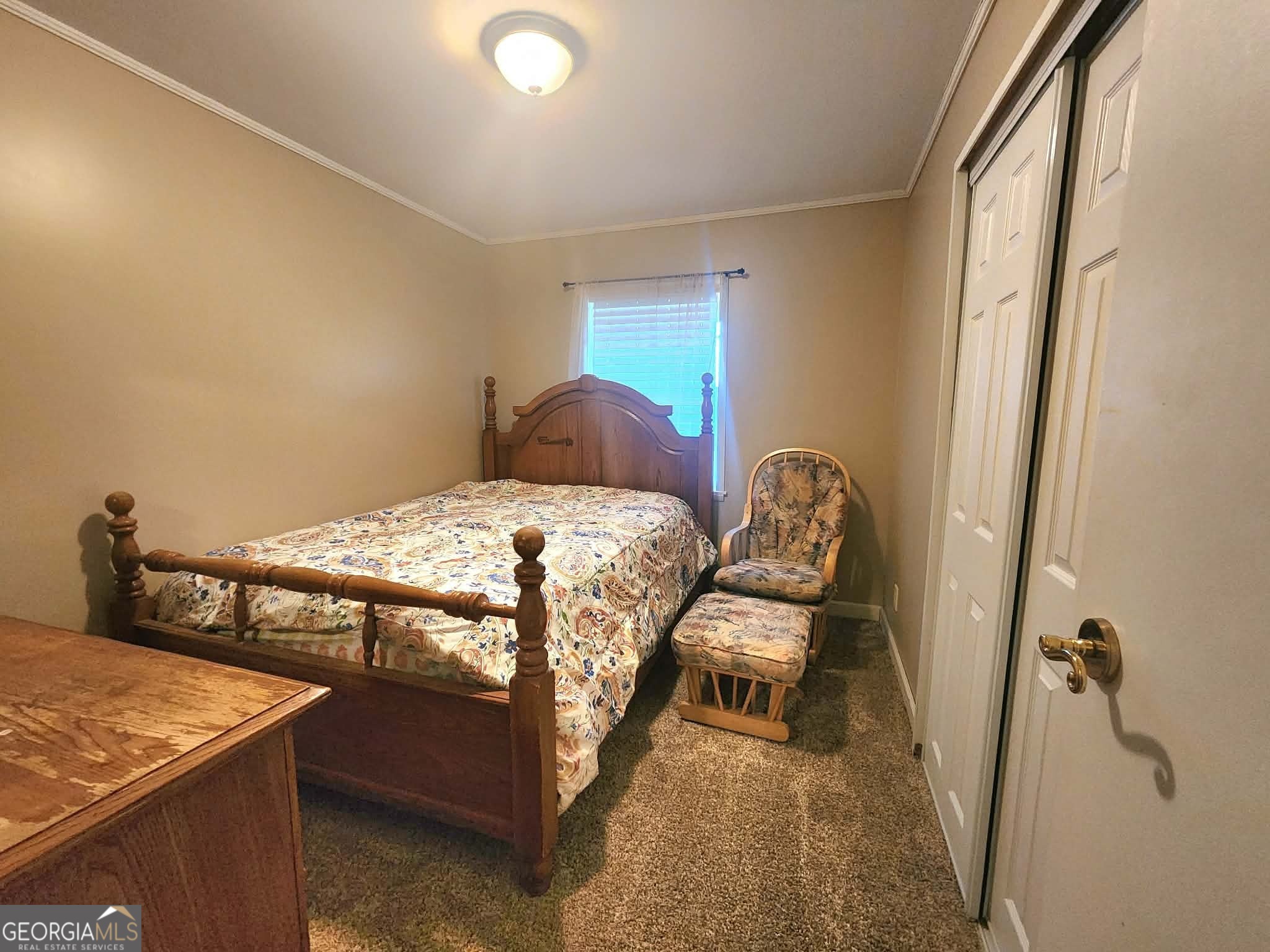 1026 Jackson Road Griffin, GA 30223 - Photo 14 of 21 a bedroom with a bed and furniture