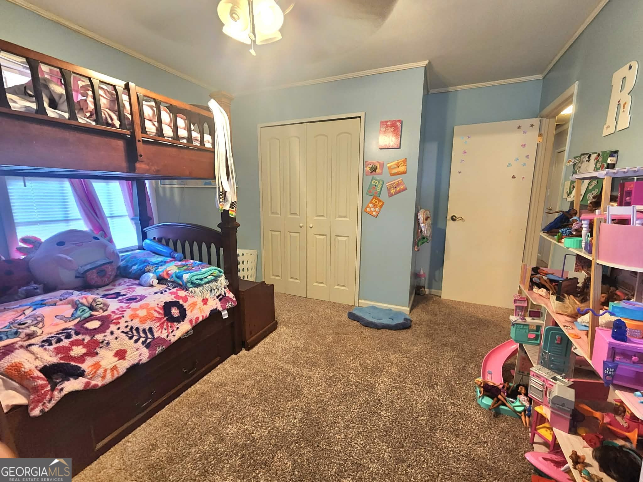 1026 Jackson Road Griffin, GA 30223 - Photo 16 of 21 a bedroom with a bed and a window