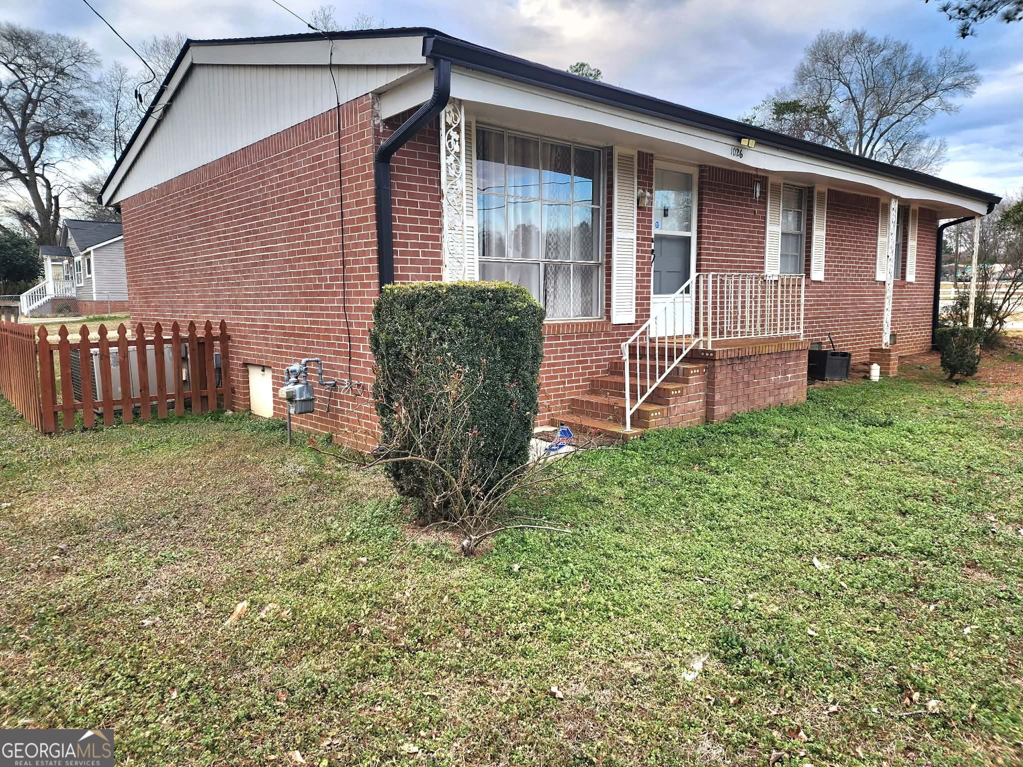 1026 Jackson Road Griffin, GA 30223 - Photo 4 of 21 a view of a house with a yard and sitting area