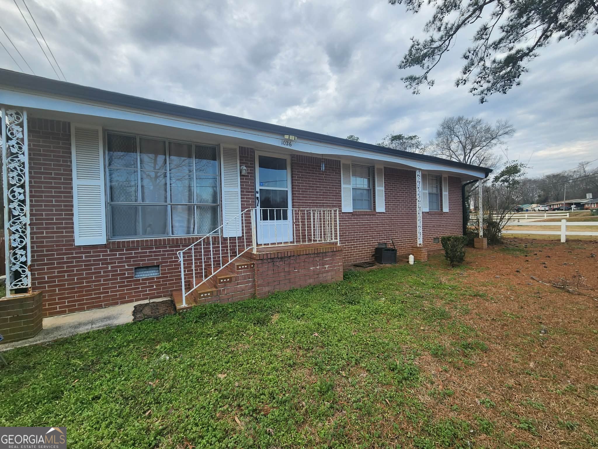1026 Jackson Road Griffin, GA 30223 - Photo 5 of 21 front view of a house with a yard