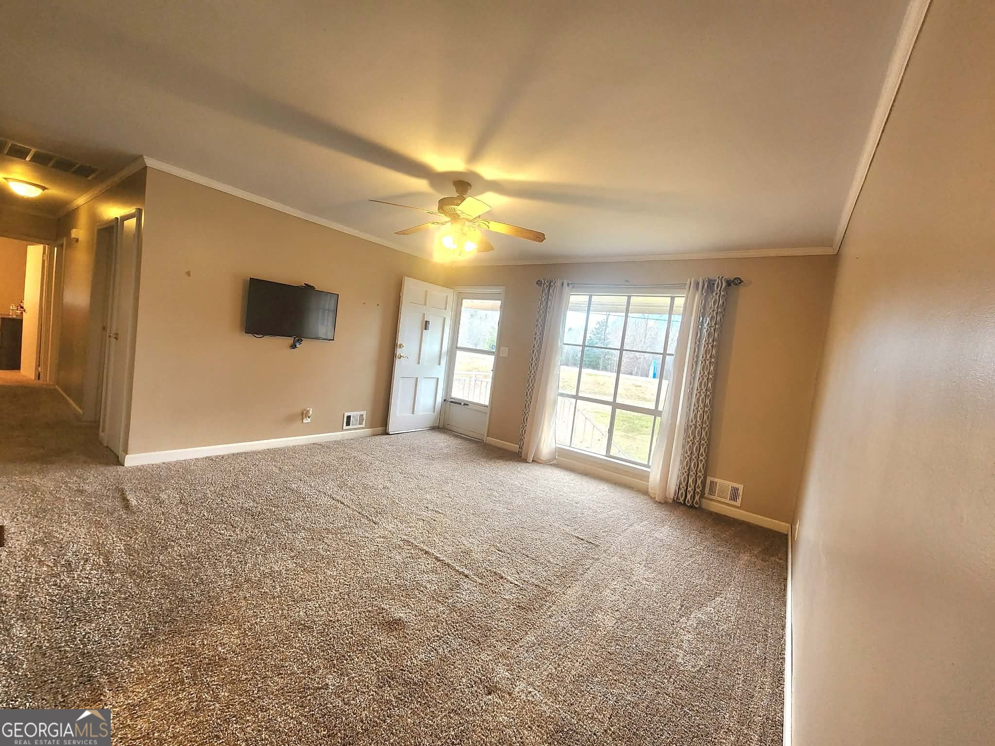 1026 Jackson Road Griffin, GA 30223 - Photo 7 of 21 a view of an empty room with a window