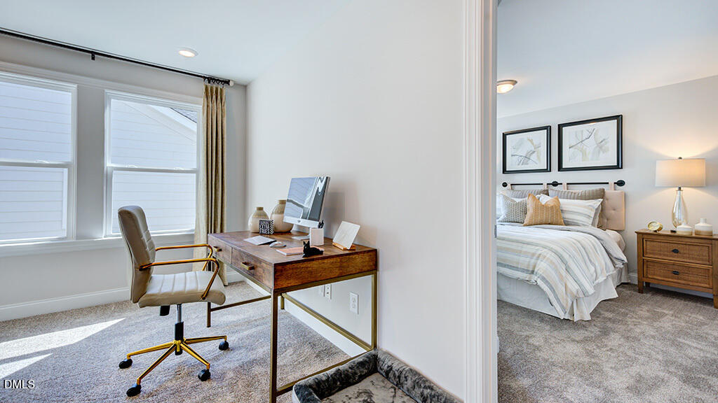 237 Tidal Pool Way Cary, NC 27519 - Photo 27 of 34 a bedroom with a bed and a window