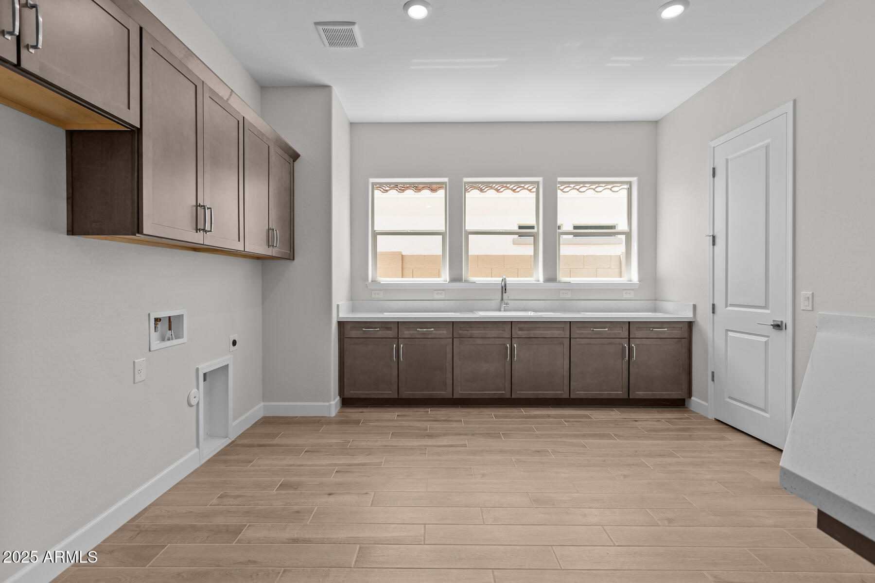 1042 Ridge Road Apache Junction, AZ 85120 - Photo 20 of 27 a view of an empty room with a window